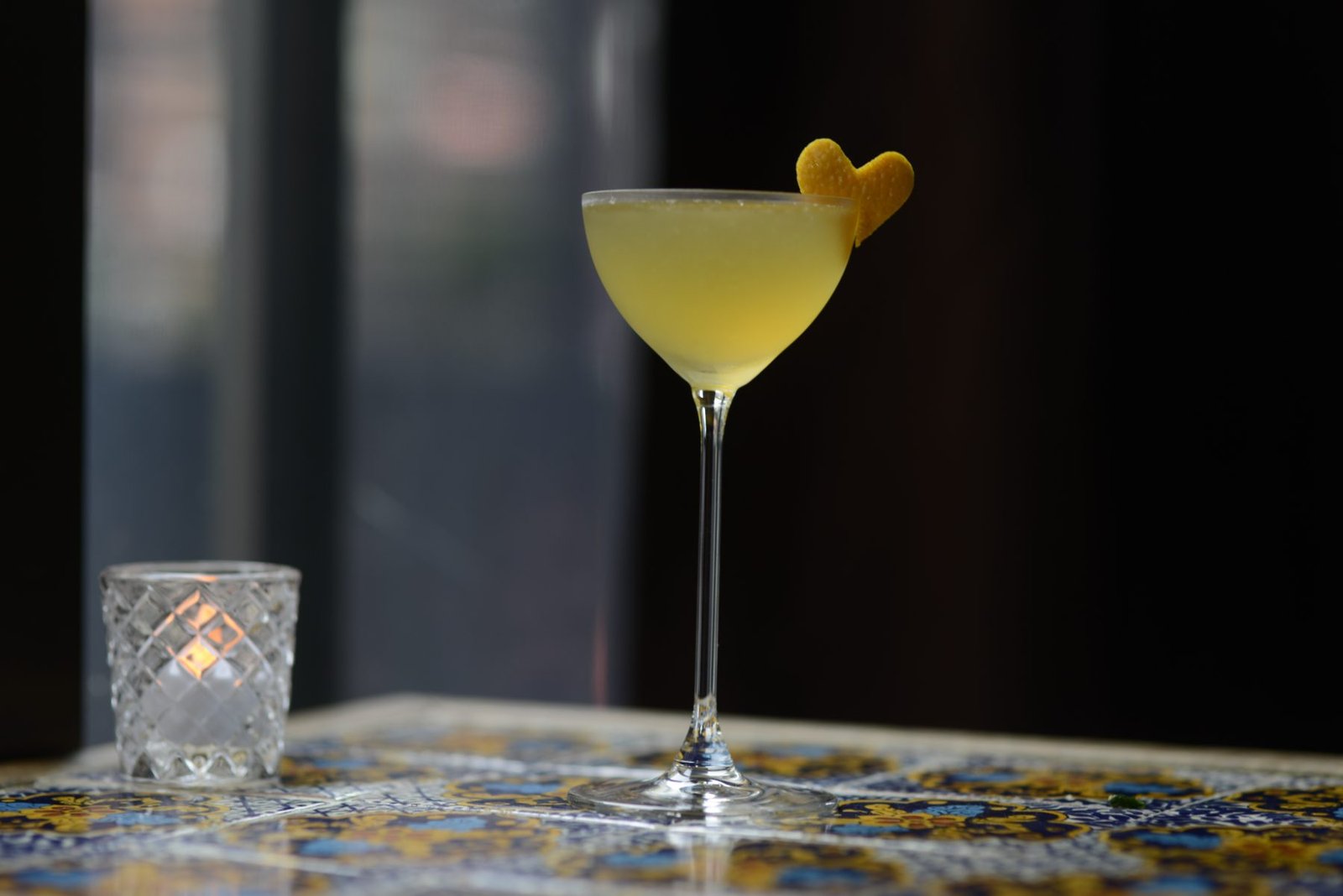 A coupe cocktail on talavera tile for a special occasion
